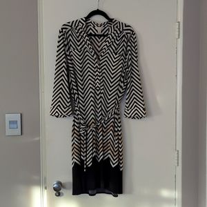 Chicos size 3 long sleeve dress. Black/white/tan stripe pattern.